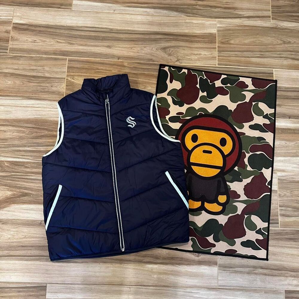 Seattle Krakens Navy blue puffer vest with white accents